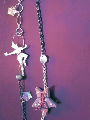 Piter Pan long necklace like new, black and multicolor