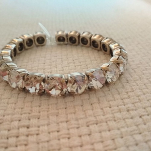 Set of three tennis bracelets like new, pink and white