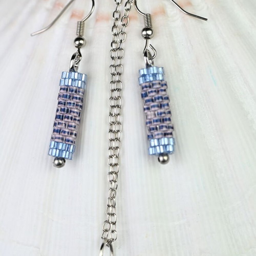 Custom-made jewelry set in light blue tones with hexagonal pendant