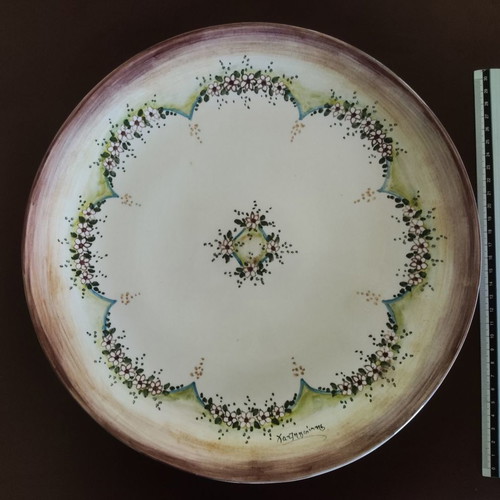 Decorative plate used with signature Hatzigiannis
