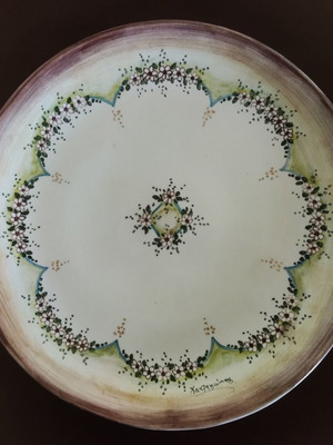 Decorative plate used with signature Hatzigiannis