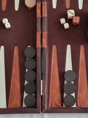 BACKBOARD IN A LEATHER CASE