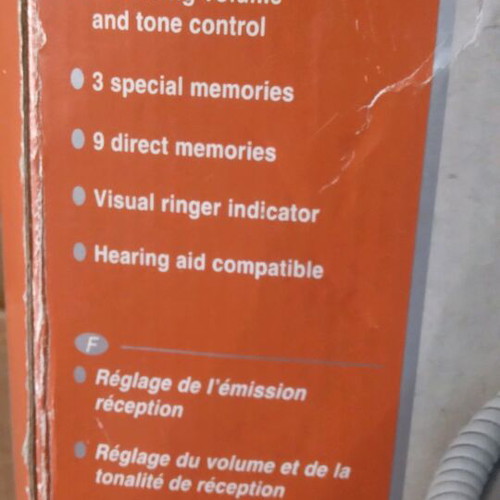 Telephone used with voice and large buttons, in its box