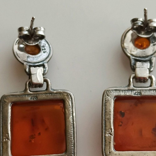 Silver 925 earrings used with natural orange amber