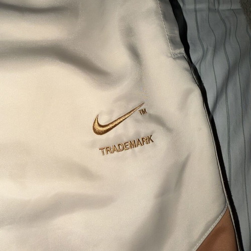 Nike Swoosh Pants like new, large, beige and brown