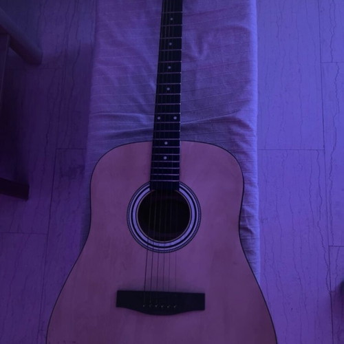 Granite acoustic guitar like new with built-in pick holder