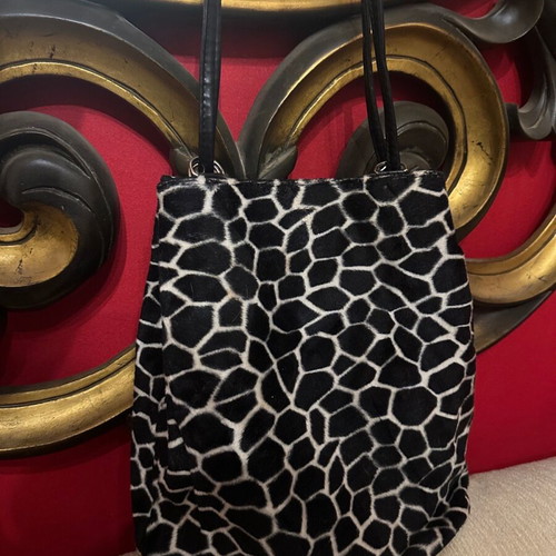 Shoulder bag used with black and white giraffe animal print