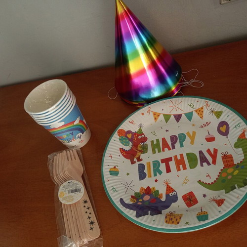Kids party set new with cups, hats, plates and wooden forks