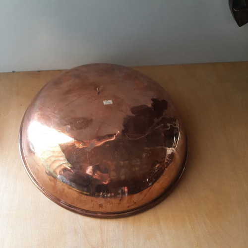 Large copper bowl used with carved details