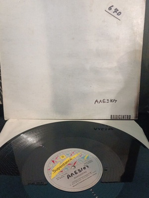 Baricentro Tittle Tattle vinyl record used, electronic