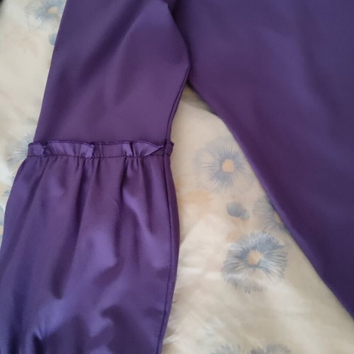 Purple dress used, medium to small, long sleeves, deep neckline