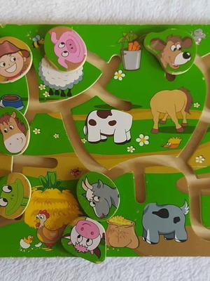 Wooden puzzle maze toy used
