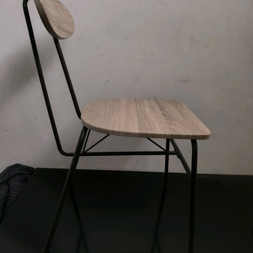 Four chairs with nice design like new, black with wooden seat