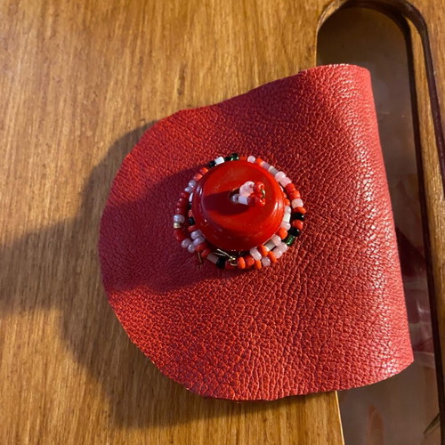 Wooden handmade bag with red leather stitched by hand