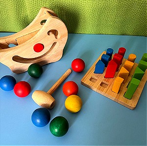 2 Βρεφικά ξύλινα παιχνίδια Plan Toys. Θαυματουργός πάγκος σε σχήμα μισοφέγγαρου με 8 χρωματιστές μπάλες και Βάση γεωμετρικών σωμάτων.