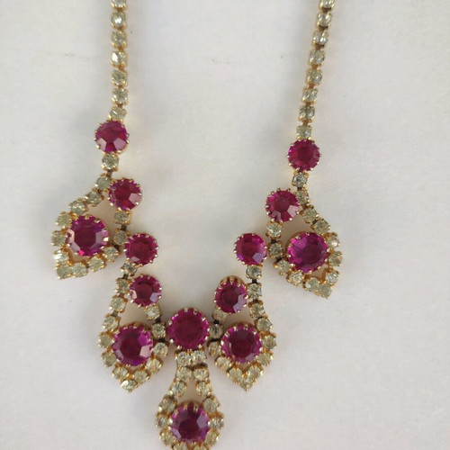 Antique necklace used with pink stones and gold rhinestones