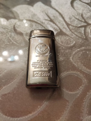 Vintage lighter used, refillable
