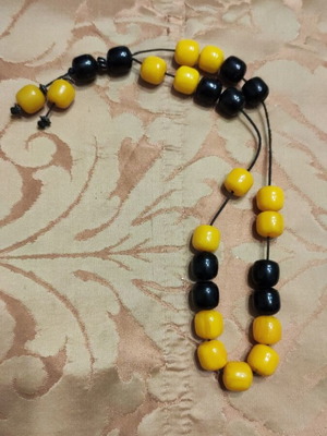 Worry beads used classic simple in yellow and black colors