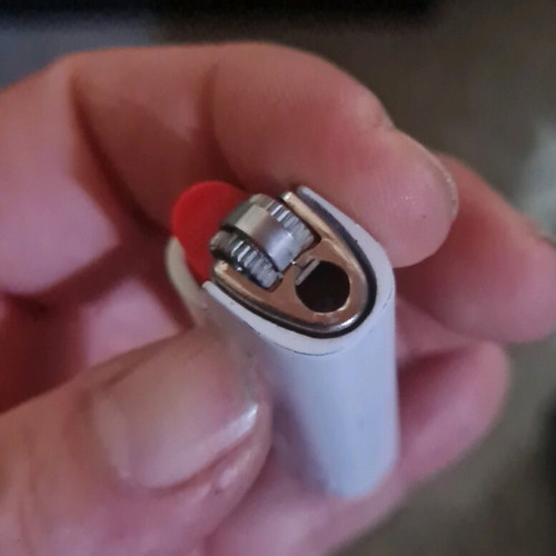 Metallic white mini lighter cases used, BiC type