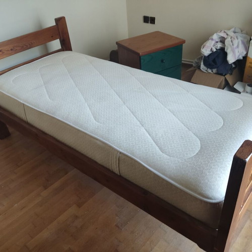 Wooden single bed with anatomical mattress and bedside table like new