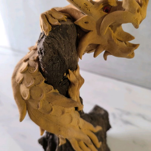 Wooden handmade dragon used with wooden base