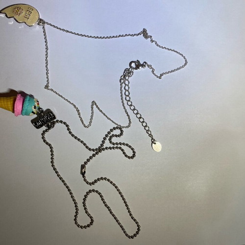 Claire's necklace like new with thin chain and half heart design