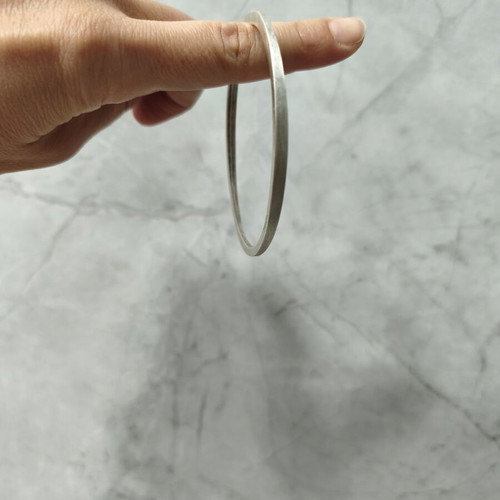 Brass bangle bracelet with matte silver finish