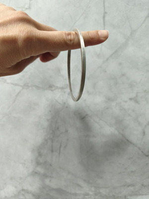Brass bangle bracelet with matte silver finish