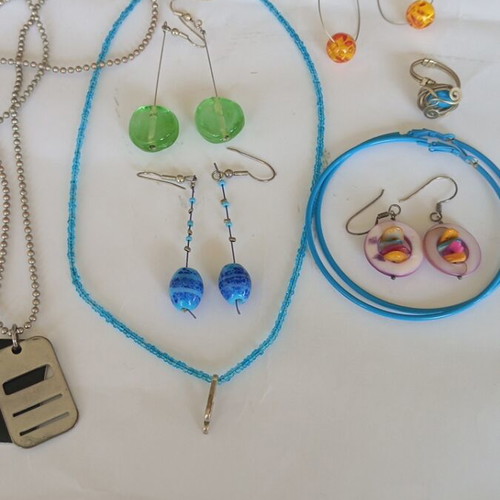 Various jewelry set like new with earrings, pendants, and ring