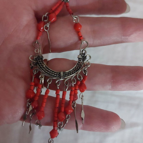 Long earrings used in red color