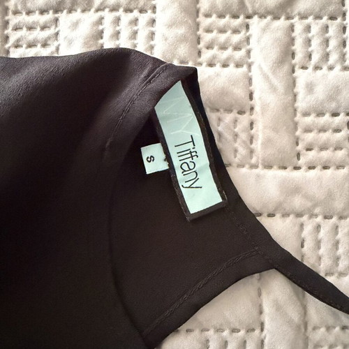 Blouse with ruffles and open back Tiffany size S like new black