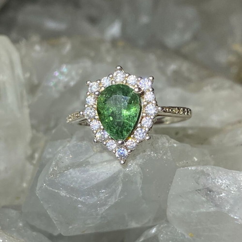 Silver ring with natural green tourmaline and moissanite