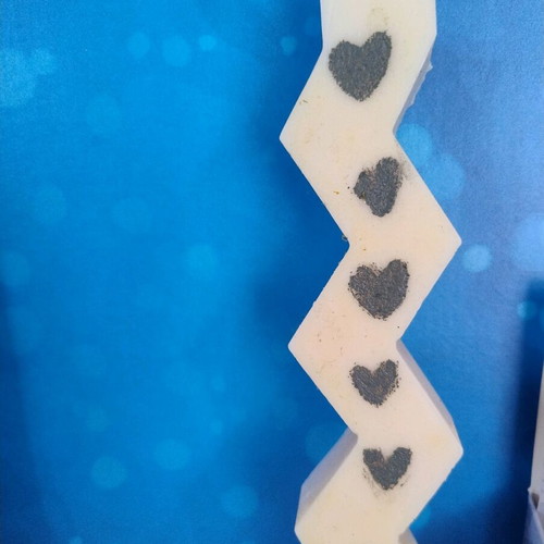Handmade zig zag candle with shaped gray hearts new