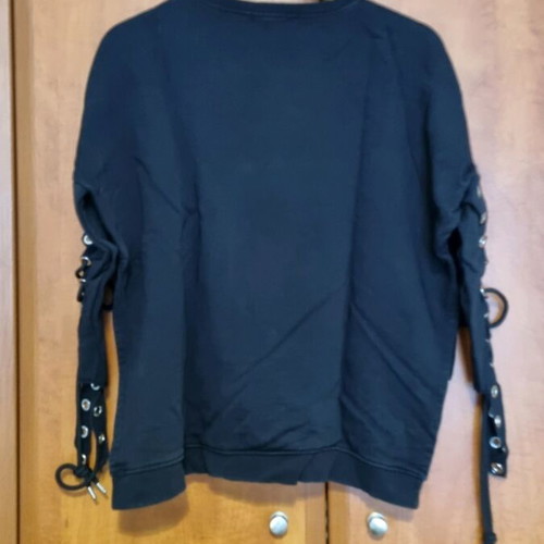 Black sweatshirt used with unique sleeves and asymmetrical design