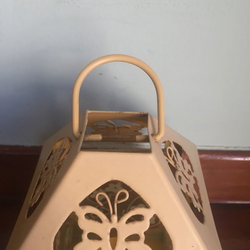 Lantern used with glass panels and embossed butterfly decoration orange-yellow