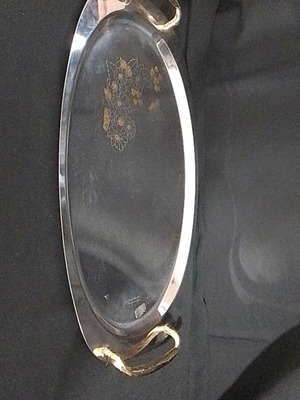 Inox serving tray used with gold-plated details Metalloung