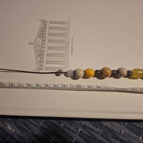 Worry beads used with colorful beads, evil eye and metal element