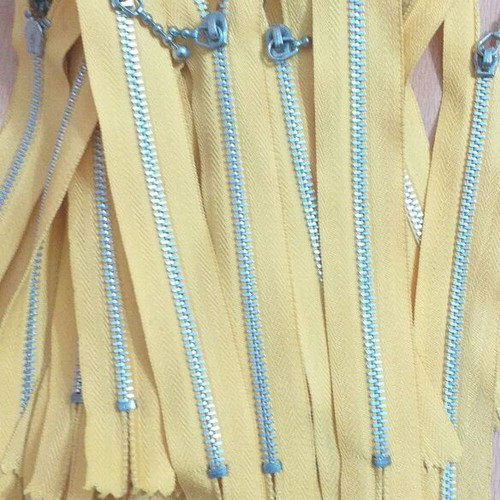 Zippers new, pack of 45, 15 centimeters, yellow