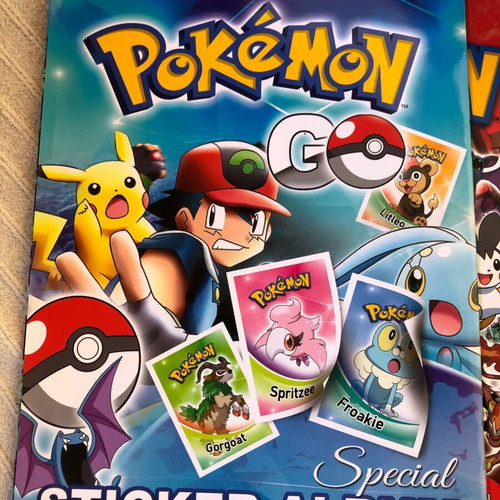 Pokémon 2016 Golden Shop and Giannakis Albums new, set of 2