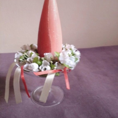 Glass candlestick with wreath and two-tone candle used