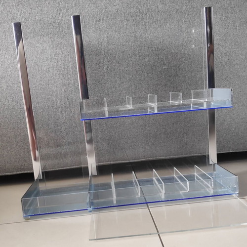 Tabletop plexiglass product display stand like new with metal decorations