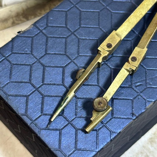 Vintage brass adjustable compass for drawing and cartography used