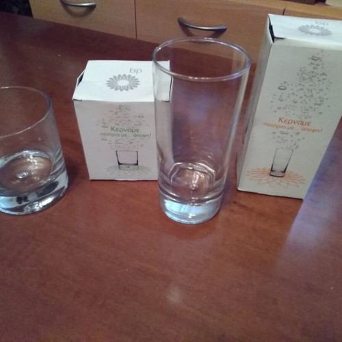 BP collectible glasses new, 6 small and 11 large