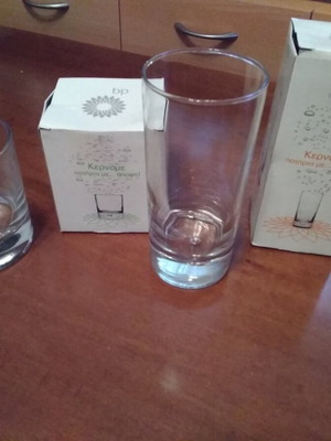 BP collectible glasses new, 6 small and 11 large
