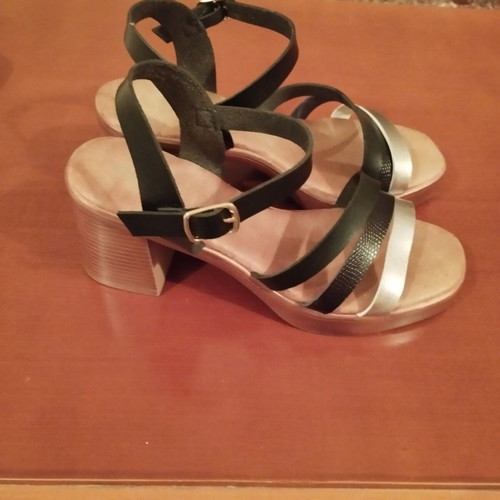 Sandal size 38 black and silver like new with strap and low heel