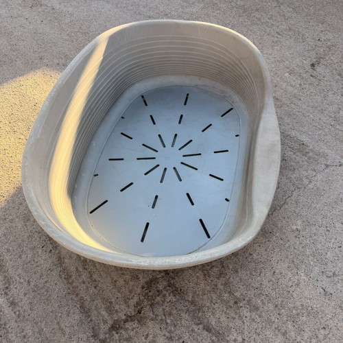 Large plastic dog bed used, outdoor weatherproof