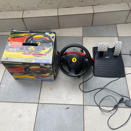Video game steering wheel with Ferrari pedals and PlayStation One like new