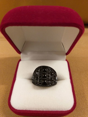 Black metal ring with embossed texture small size