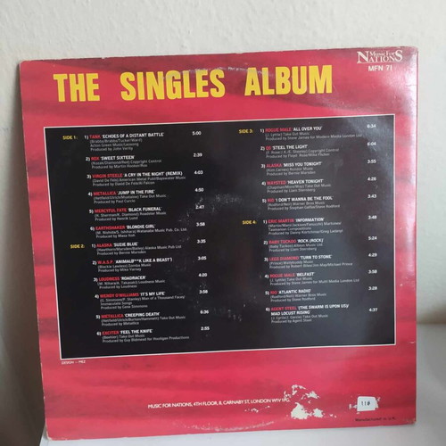The Singles Album double vinyl used, heavy metal