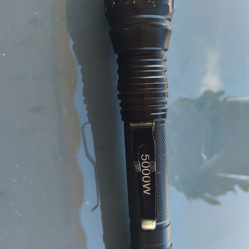 Rechargeable flashlight used with zoom and two LX 18650 6800mAh batteries